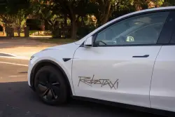 Tesla says its robotaxi app now open to public riders