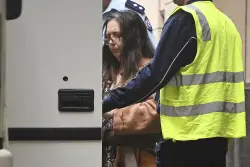 Australian woman is sentenced to life for poisoning relatives with mushrooms